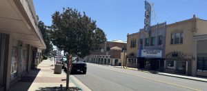 View of Downtown Banning California showing the Fox Theater across the street from Banning Tech Know phone and computer repair store
